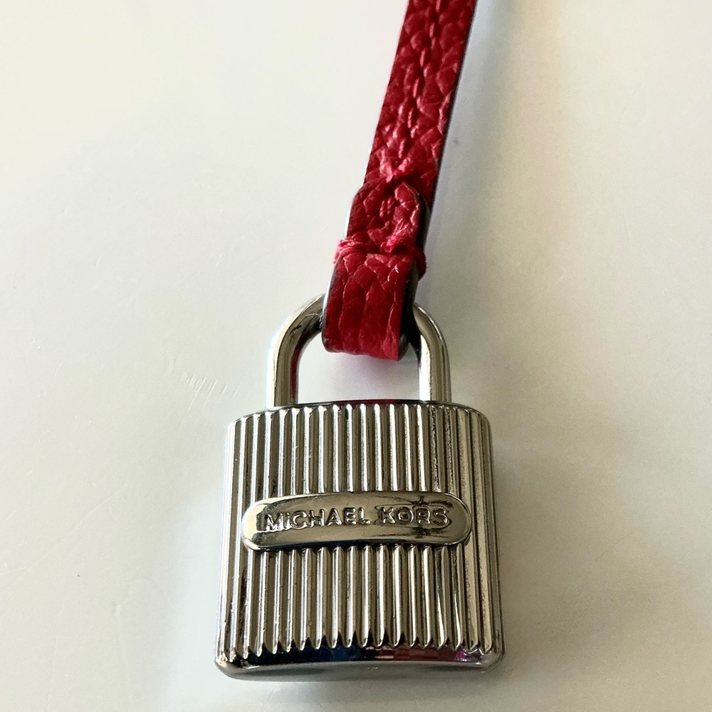 MICHAEL KORS, Silver Padlock with Red Pebbled Strap, Fog Bag Charm